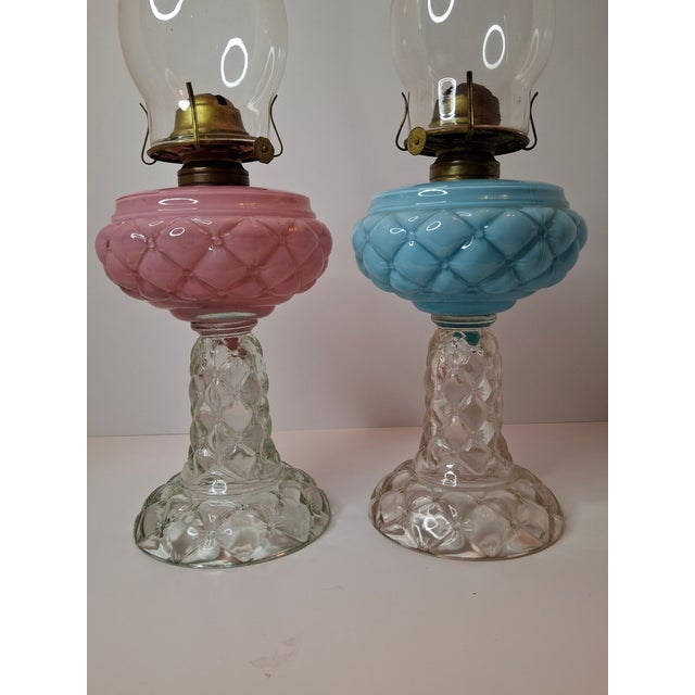 Available for sale is a magnificent and rare coordinating pair of Victorian-era kerosene stand lamps in the iconic...