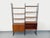 Vintage modular Scandinavian-style bookcase from the 1960s, in two parts, made of teak wood and black metal, with 6 open...