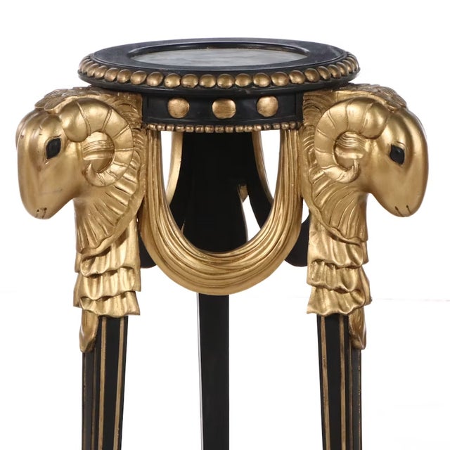These commanding late 20th-century neoclassical style pedestal stands or occasional tables possess an extraordinary...