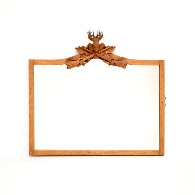 A wonderful antique carved oak stag mounted mirror. This was made in England, it dates from around the 1950’s. It has a...