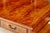 A Chippendale-style writing desk in mahogany with satinwood banding and brass hardware — a piece of scale, proportion, and...