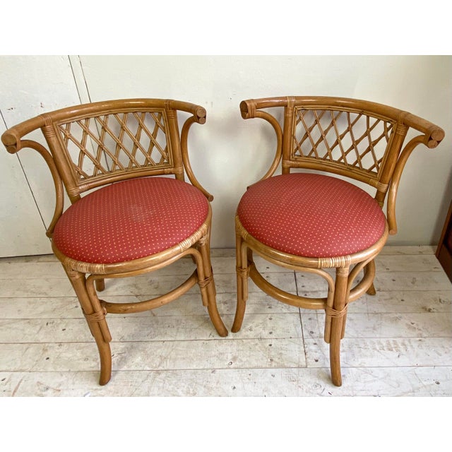 Handsome pair of vintage Bamboo and Rattan side chairs with authentic fabric. In a good vintage condition, no damage.