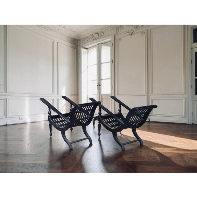 Stunning and character-filled, these 19th Century Anglo-Indian plantation lounge chairs have the distinct appeal,...