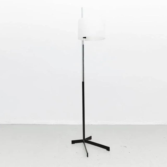 This floor lamp was designed by Miguel Milá and manufactured by Tramo circa 1950. The piece is a first edition and...