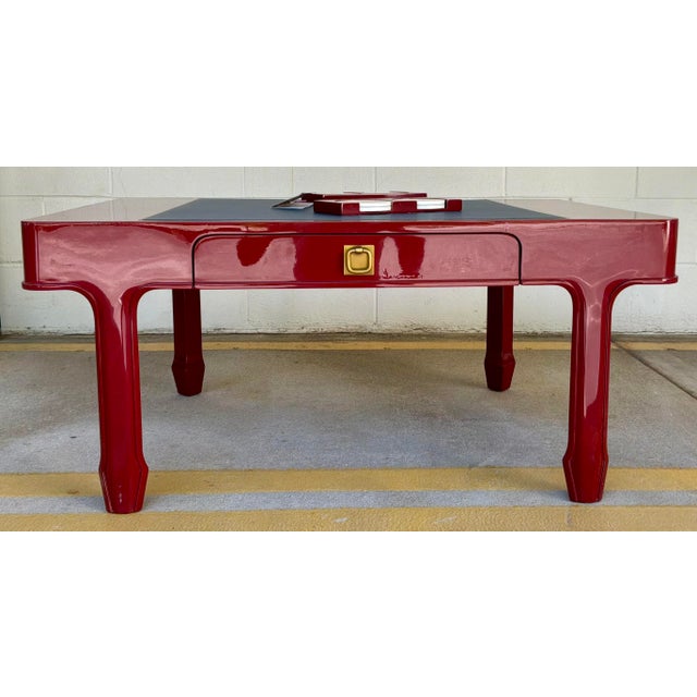 Original retail $3440, stylish Jonathan Charles Red Lacquer Polly Rose Cocktail Table, blue leather, gold accent, two...