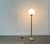 Impressive floor lamp from the italian manufacturer artemide based on a design by anna fasolis and enzo mari from the...