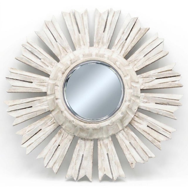 Late 20th-Century sunburst mirror with a circular carved surround and double rays. It has a lovely organic light gray and...