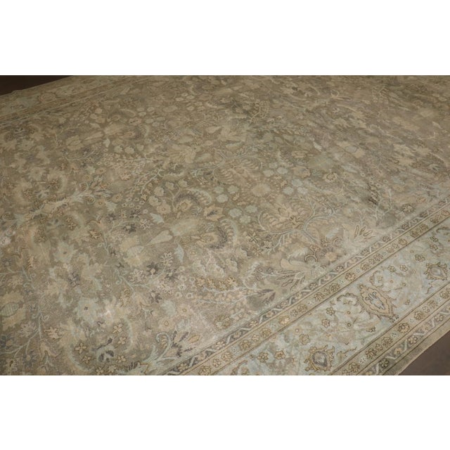 An early 20th century North Indian Larestan rug with an all-over design in grays and greens