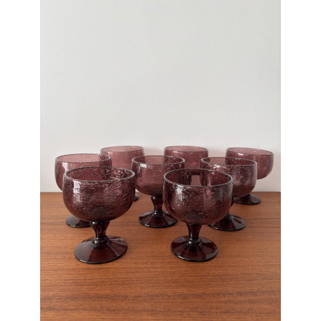 Stunning vintage punch set in handcrafted bubbled glass, in an elegant plum/amethyst hue. Each piece features delicate...