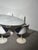 Exceptional 7-piece Italian Tulip dining set by Rudi Bonzanini , dating from the 1960s/70s and inspired by the iconic...
