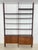 Beautiful, modular shelving system in timeless Scandinavian mid-century design. The unit impresses with its elegant teak...