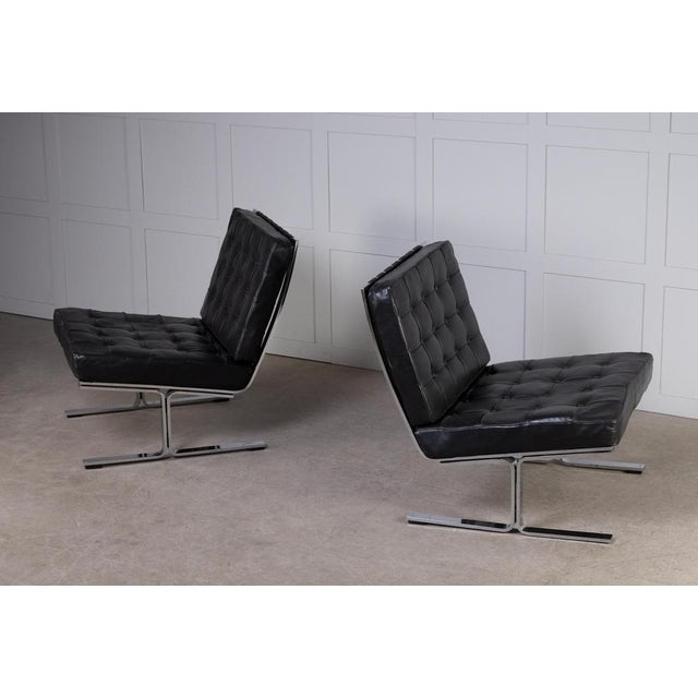 Design Karl-Erik Ekselius, produced by JOC in Vetlanda, Sweden, 1960s. Chromed steel and original black leather cushions....