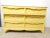 Charming yellow mid century lowboy dresser. It's swirl design on the handles are edged with a antiqued white paint look...