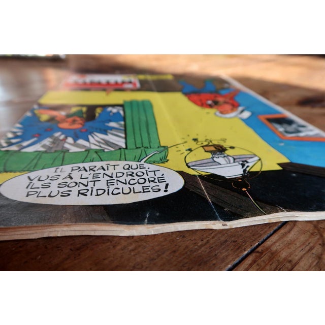 An original issue of Le Journal de Tintin No. 524, dating to November 1958, featuring a lively and humorous illustrated...