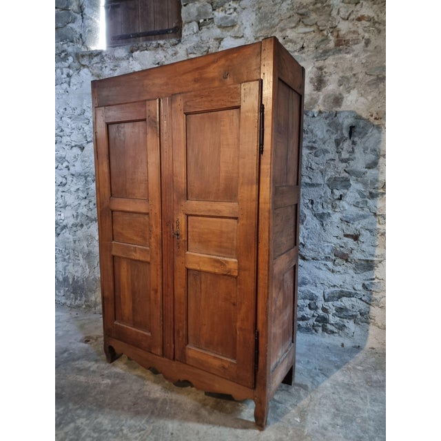 This French cabinet dates from the late 18th century and is primarily constructed from solid cherry wood, with elements of...