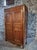 This French cabinet dates from the late 18th century and is primarily constructed from solid cherry wood, with elements of...