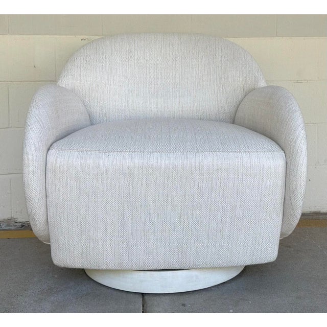 Original retail $3800, stylish Art Company White Performance Rothko Swivel Chairs Pair, plinth base, showroom floor sample