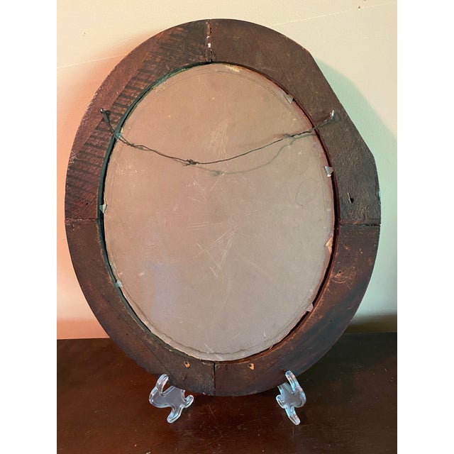 This painting, signed by L S Weeks, is an oil on board. It is undated. The classic oval frame measures 18"H x 14"W. The...