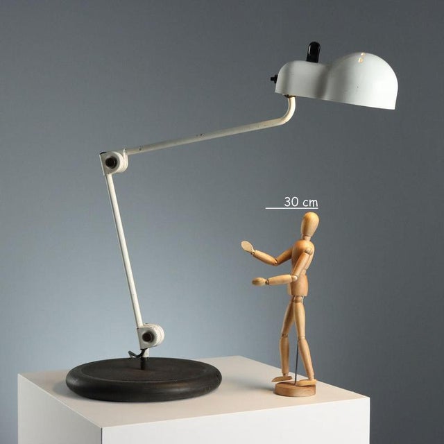 Topo' lamp model, designed by Joe Colombo and produced by Stilnovo in the 1960s. Made of painted aluminum and chromed...