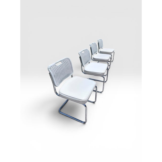 1970s Vintage Set of Four Chrome Cantilever Dining Chairs With White Woven Rattan Backs For Sale - Image 5 of 11