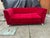 The Monster Sofa by Bretz is upholstered in red fabric and stands on silver feet. The three -seater is characterized by...
