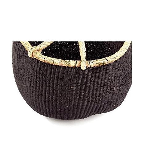 Artisans in the Bolgatanga region of Ghana weave these beautiful and durable baskets from thick, tough elephant grass. A...