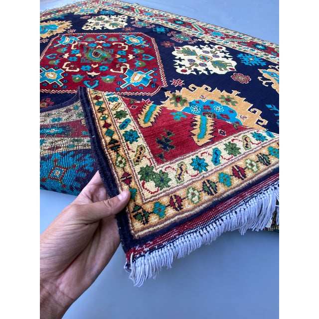 Handmade Afghan Bokhara Medallion Rug – Rich Red, Blue & Gold Tribal Design – 4'8" X 6'9" For Sale - Image 10 of 10