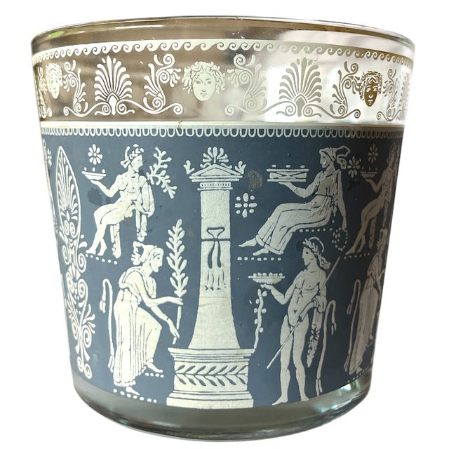 A beautiful and highly collectible vintage cocktail set by Jeannette Glass Company, featuring the sought-after Corinthian...