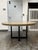 Design Plus Gallery presents the T-Brace Round Dining Table by Julie Lawrence for Restoration Hardware. Inspired by the...