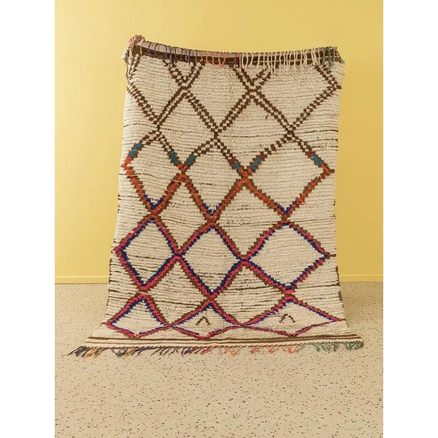 This Azilal is a vintage Berber carpet, which consists of high quality new wool and recycled wool - soft and cozy under...