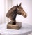 Add a bold statement of strength, elegance, and craftsmanship to your living space with this Antique Brass Finish Horse...