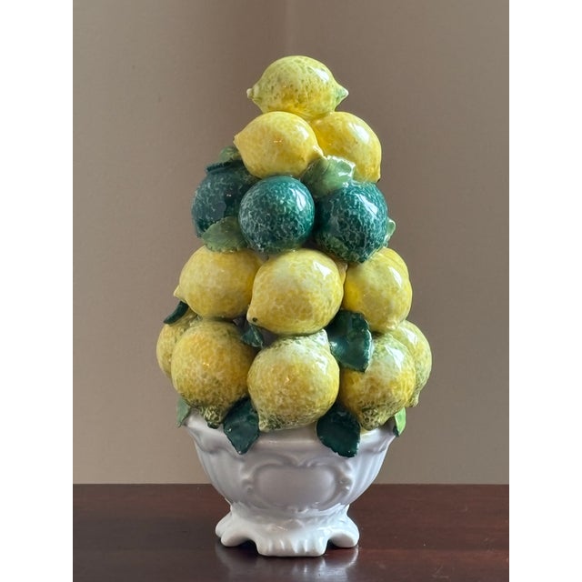 Offering a small vintage majolica topiary from Italy, circa mid- to late-20th century. This pretty hand-glazed ceramic...