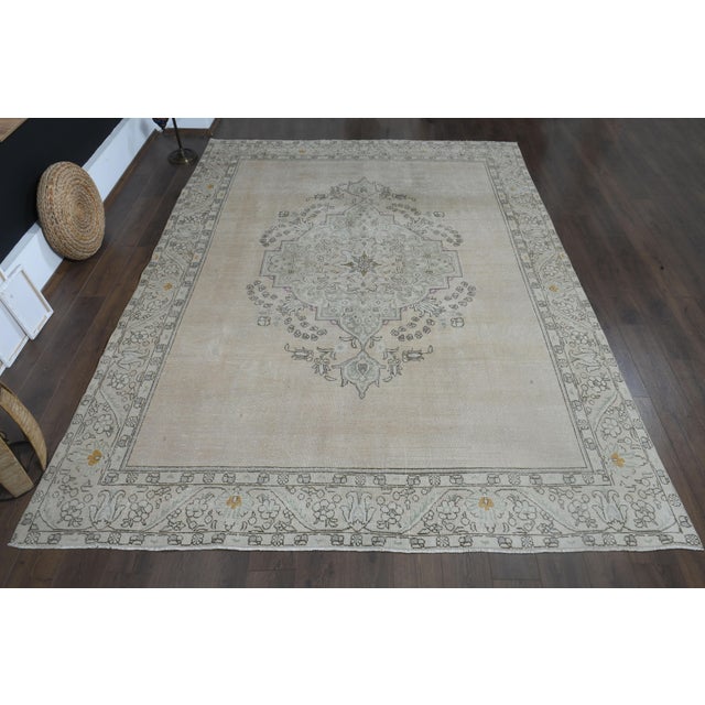 Vintage Persian Hand-Knotted area rug is a semi-antique vintage area rug. The '70s Eastern region of Anatolian's unique...