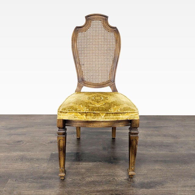 Wood side chairs with cane backs and velvet upholstered seats. Brand: Century Furniture. Dimensions (in): 19W x 18D x 43H.