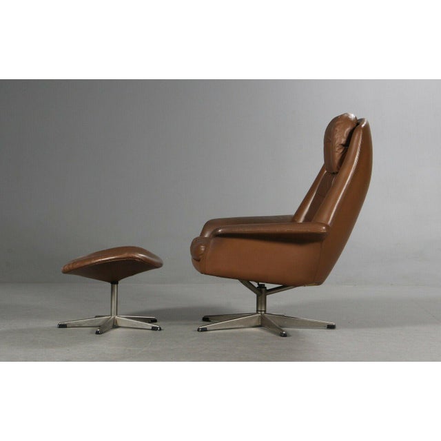 Vintage Danish Cognac Leather Lounge Chair & Stool by H. W. Klein, in Flawless conditions. Designed 1970 to 1979 I have...