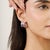 Featuring 2 mm amethyst gemstones with a total weight of 4.36 carats, these earrings are crafted in 925 sterling silver...