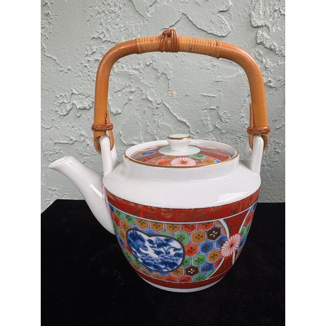 Bring a touch of Japanese artistry to your space with this vintage Otagiri Japan porcelain teapot, beautifully decorated...