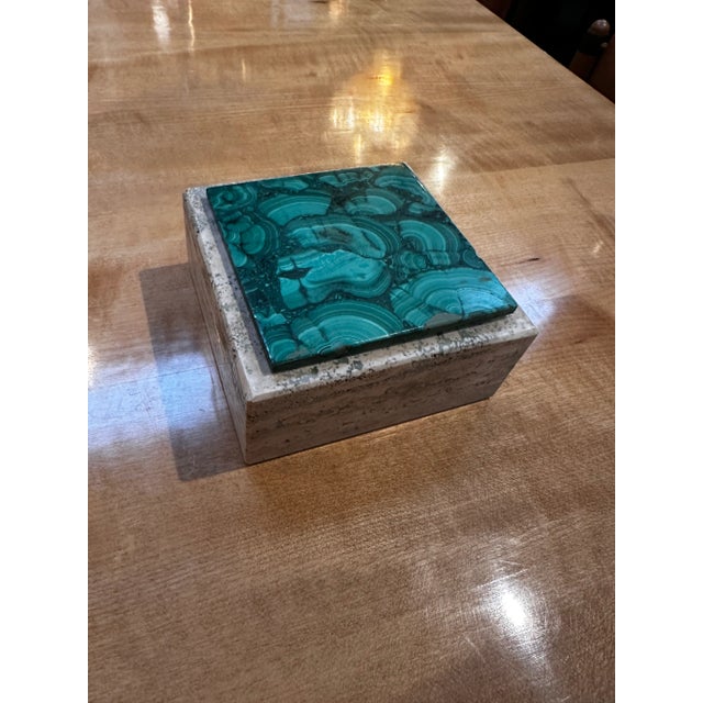 Indulge in the elegance of our Vintage Italian Travertine and Green Marble Ashtray, a captivating piece from the 1990s....