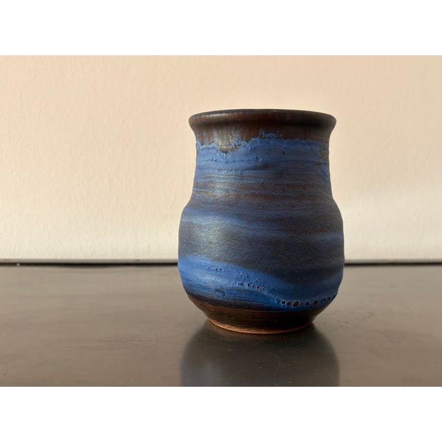 The studio was founded in 1959. Its trademarks are its specific effect glazes, most notably the deep "Bleu Ludovic". This...