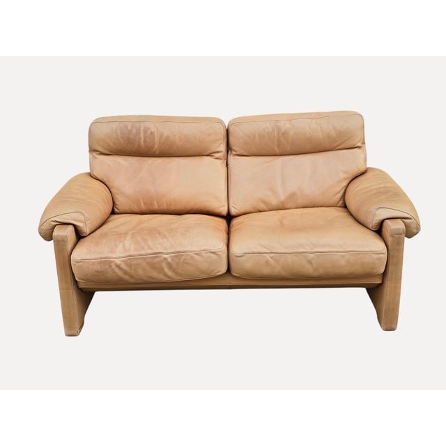 Two-seater sofa by the swiss brand de sede, model ds-70, dating from the 1980s. overall condition: the original leather,...