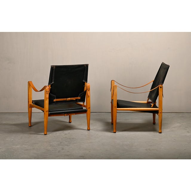 Iconic pair Safari armchairs (model KK 47000) designed by Kaare Klint in 1933 and manufactured by Rud Rasmussen, Denmark....