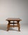 Rendered in rich wood with hand-forged iron accents, this Spanish-style table from circa 1960 France captures the robust...