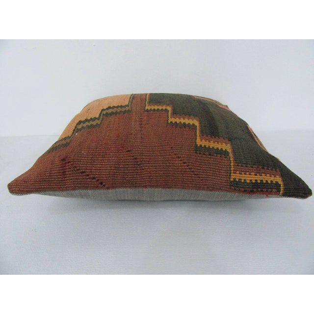 Handmade decorative pillow cover made from a vintage Turkish kilim rug. Backed with good quality cotton fabric. Pillow...