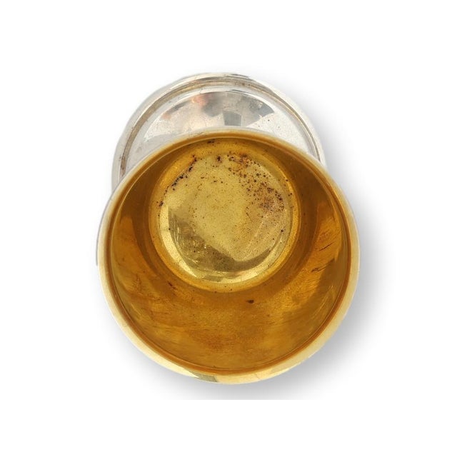 An elegant English silverplate golf trophy goblet dated 1891, beautifully finished with a richly gilded interior that...