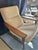 Solid ash wood arms and legs. Engineered wood seat and back. All wood is kiln-dried for extra durability.