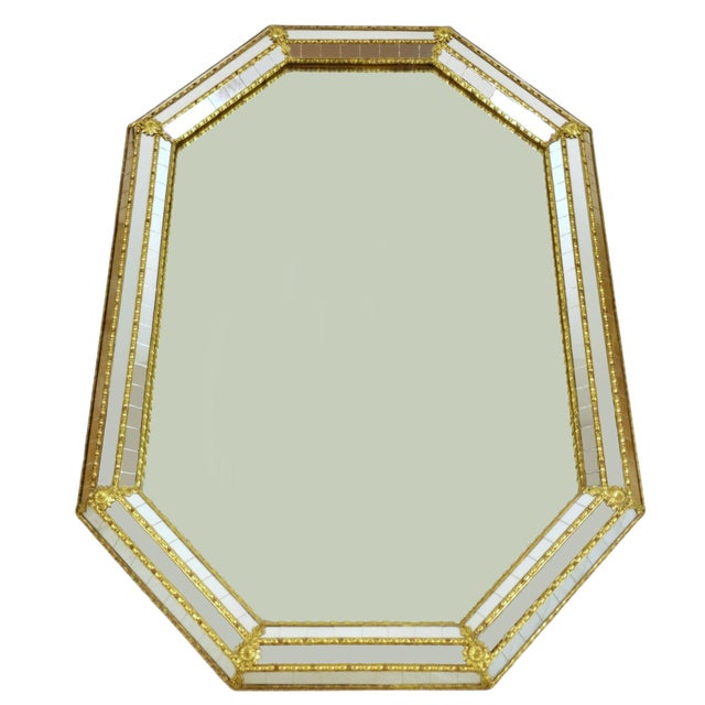 An elegant, octagonal wall mirror that captivates with its architectural form, directly referencing the rich tradition of...