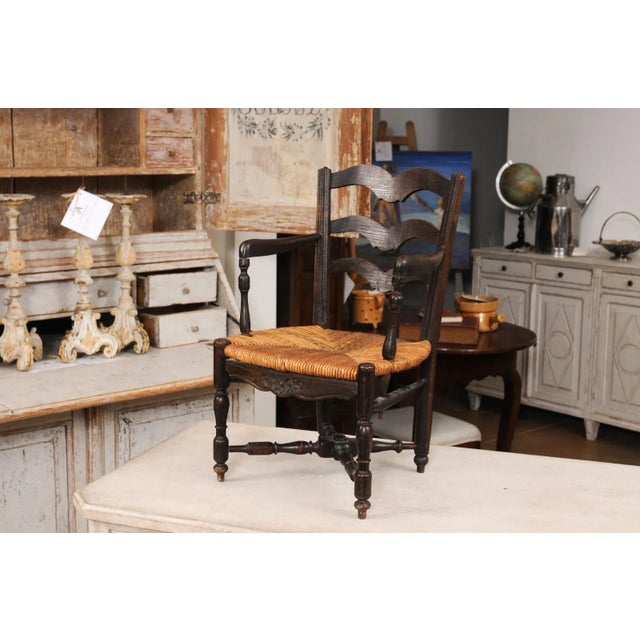 Rustic French Rustic Dark Oak 19th Century Child's Chair with Ladder Back and Rush Seat For Sale - Image 3 of 12