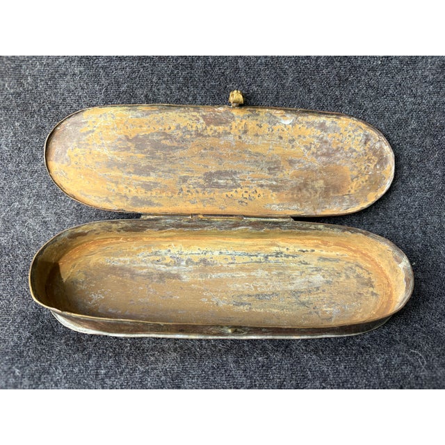 Lovely small antique long oval copper tobacco hinged box. Fine hammered design just in from the rim on the lid. Snap...
