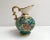 Vintage, hand painted ewer. gorgeous faience pitcher vase with a beautifull turquoise background decorated with a bright...