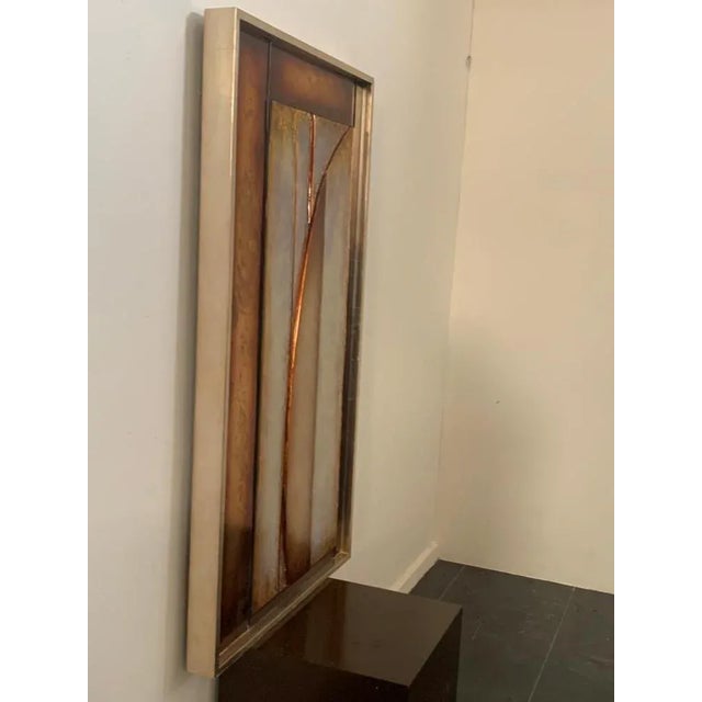 Large resin panel carved, modeled and retro decorated and fixed on wood. The thick geometric modules are laid at 2 levels...